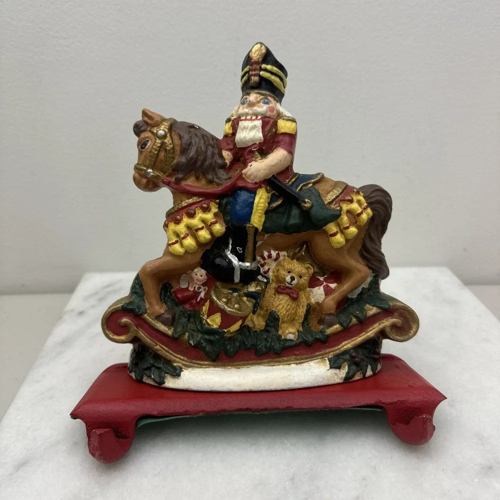 Cast Iron Christmas stocking hanger Nutcracker rocking horse double hook Vintage